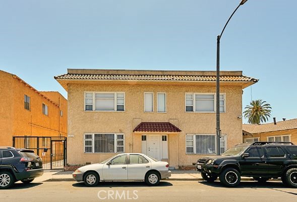 a view of a car parked in front of a house