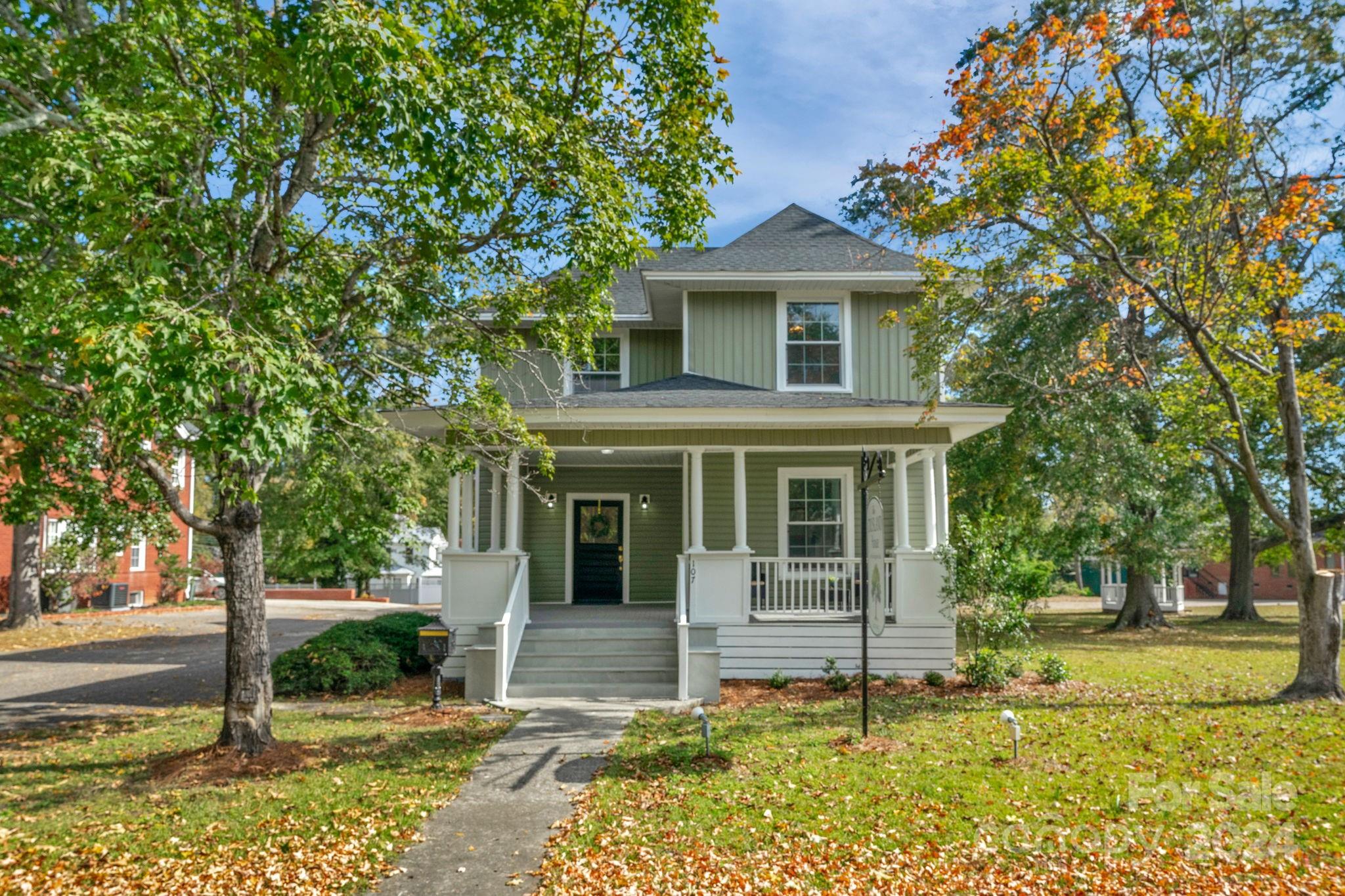 front view of a house with a yard