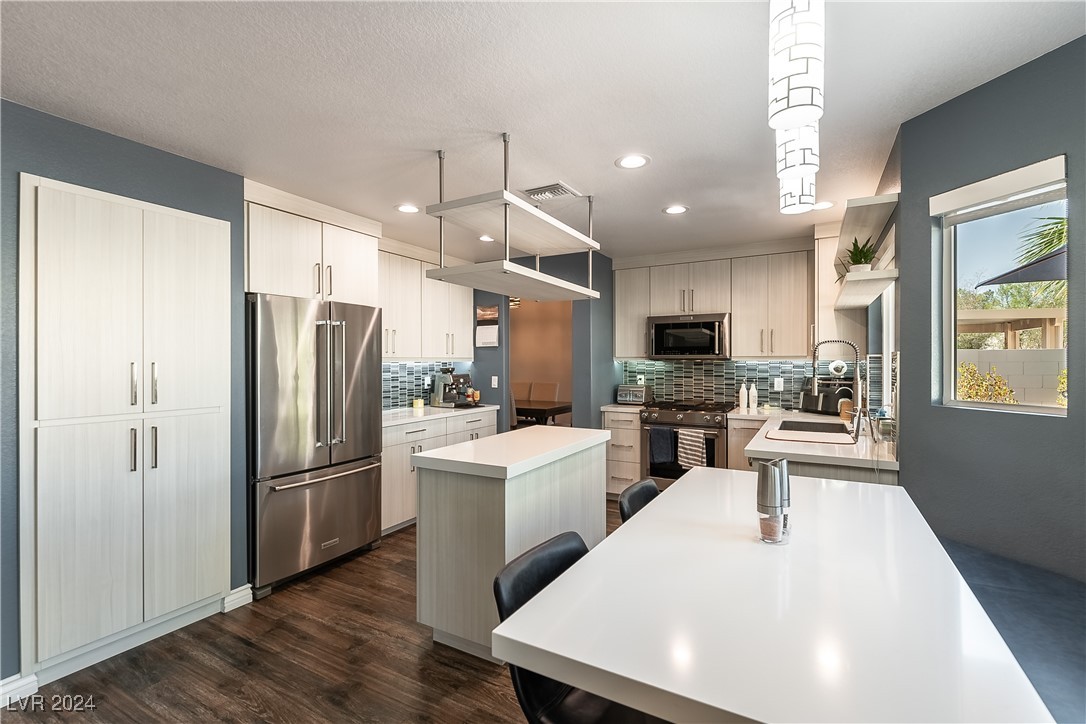 STUNNING, newly remodeled kitchen with quarts coun