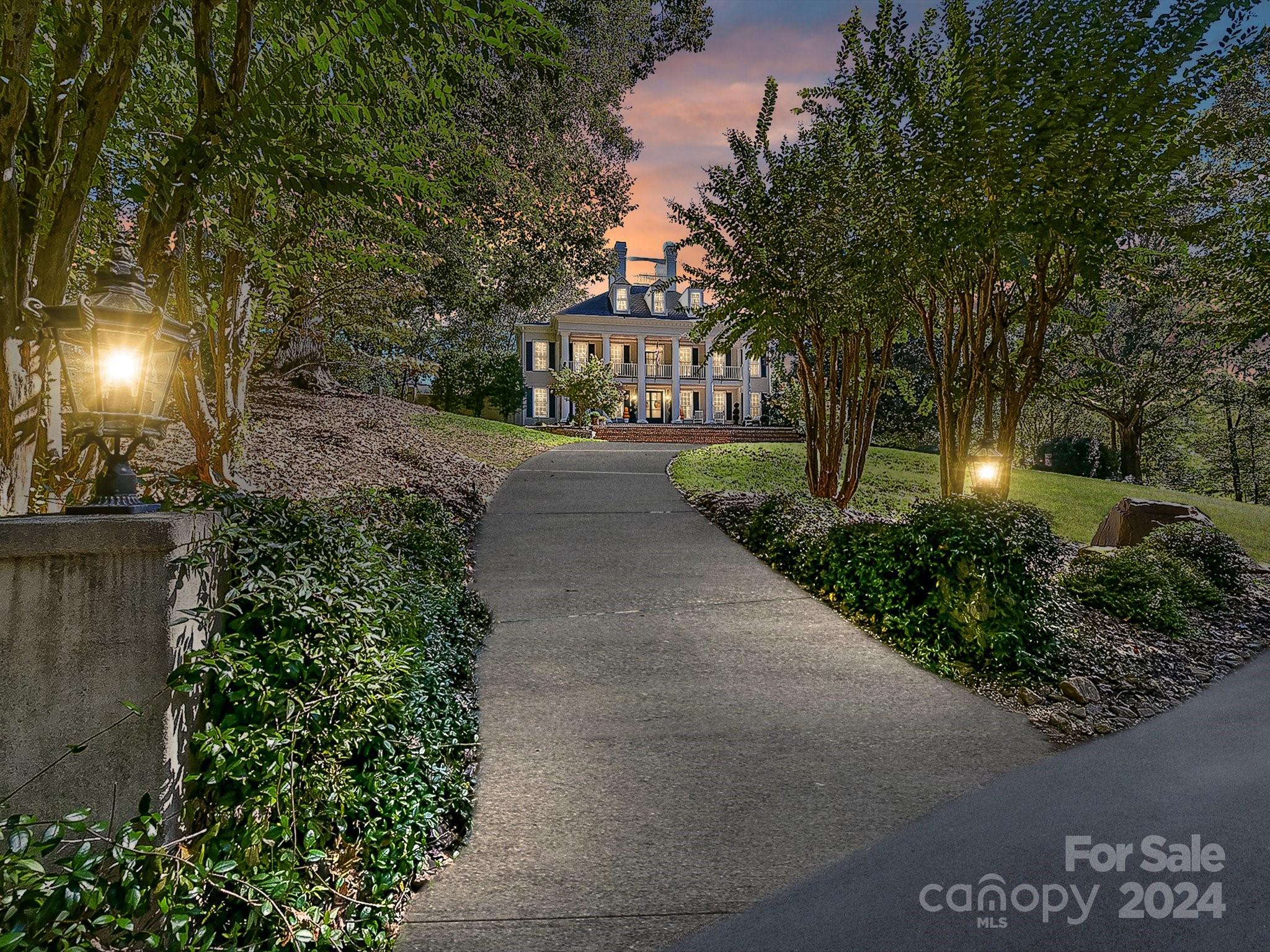 a view of a pathway both side of house