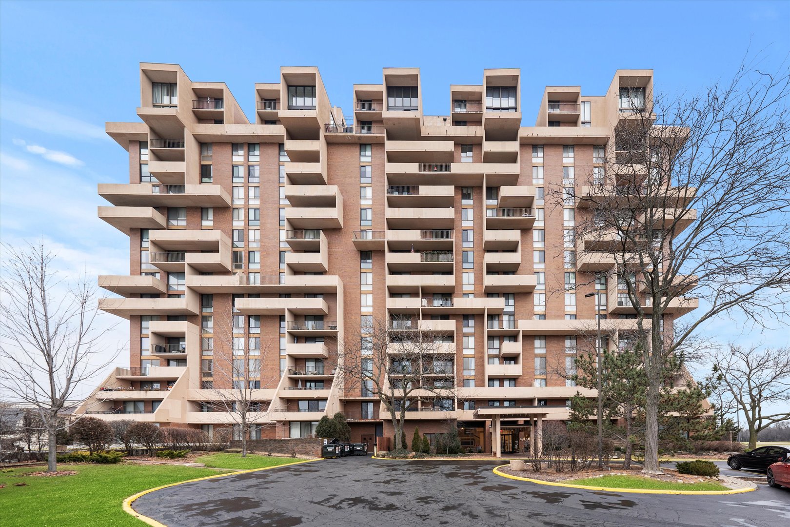 a front view of a building with street view