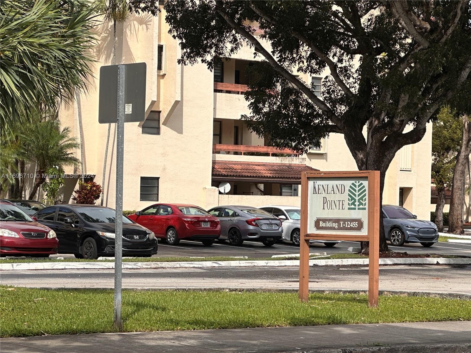 a front view of a building with street view