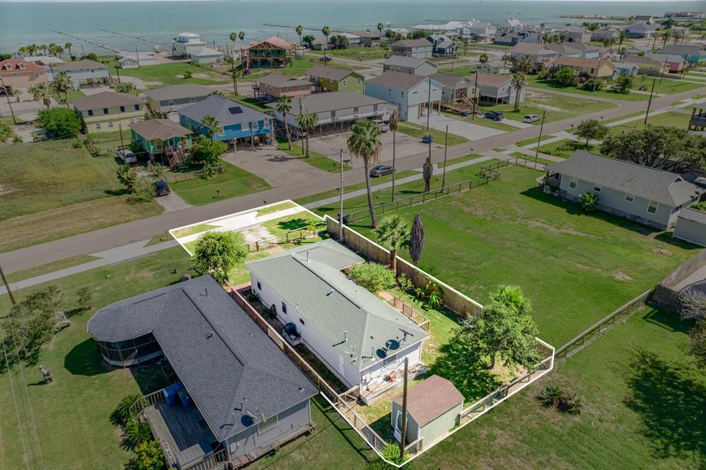 an aerial view of a house with a garden