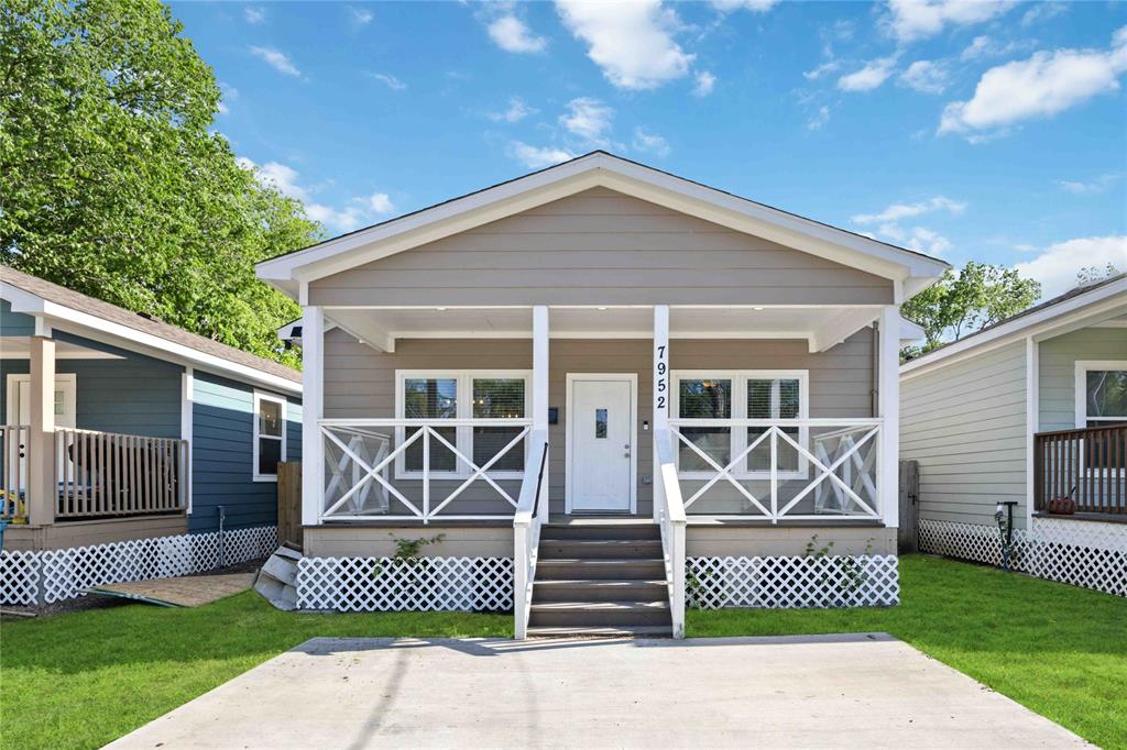 a front view of a house and garage