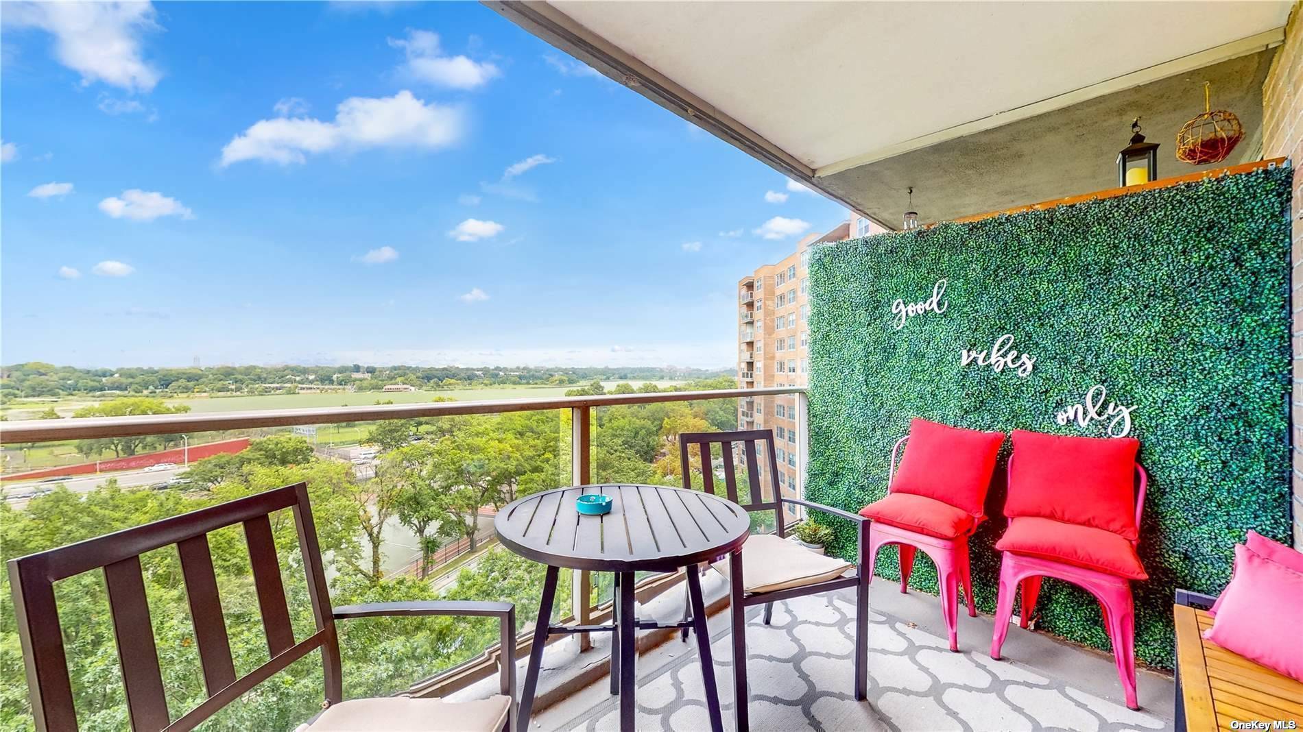 a view of a chairs and table in patio