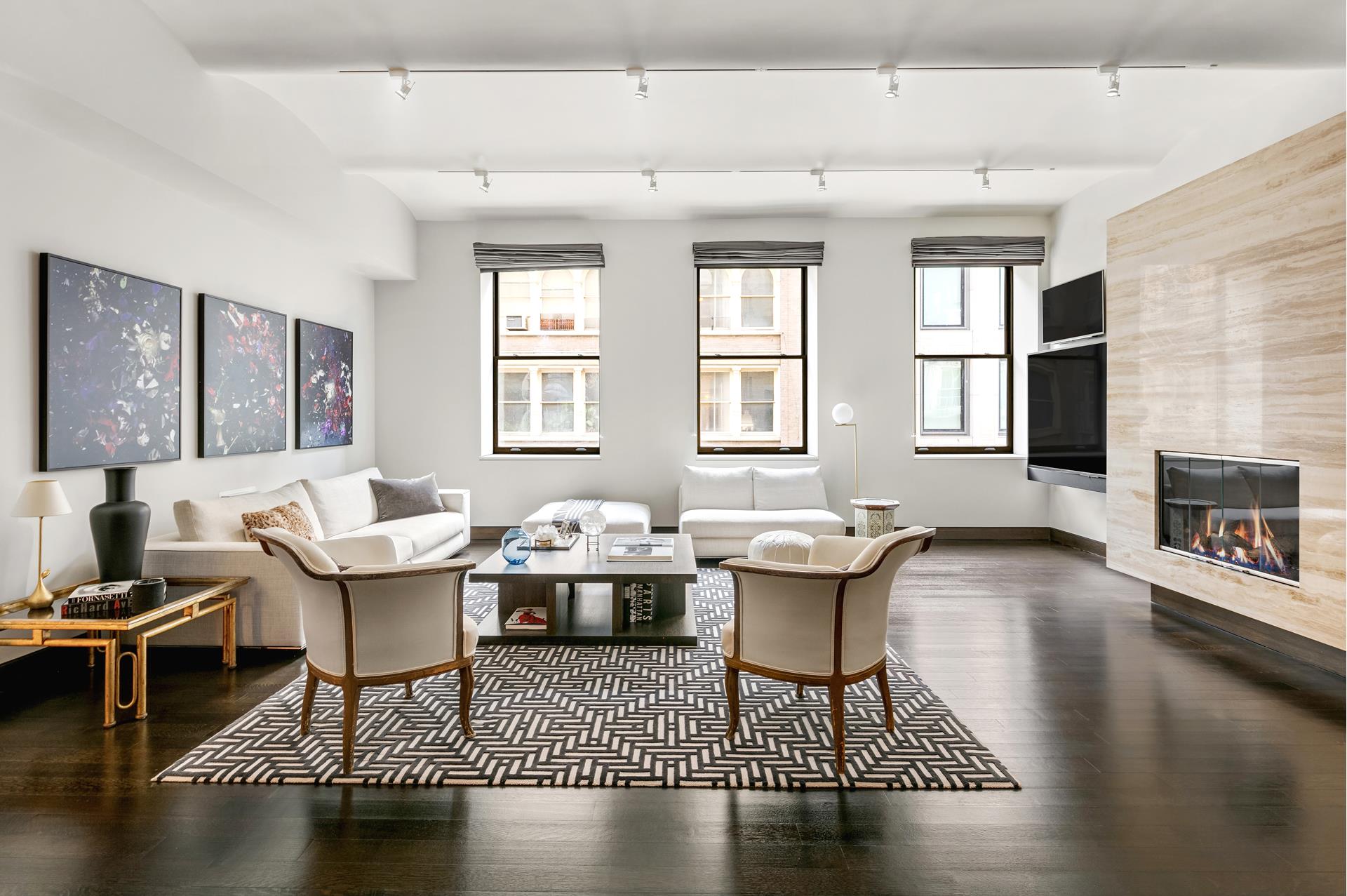 a living room with furniture rug and window