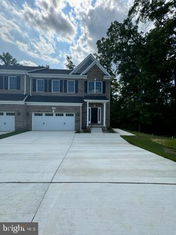 a view of house with outdoor space and deck