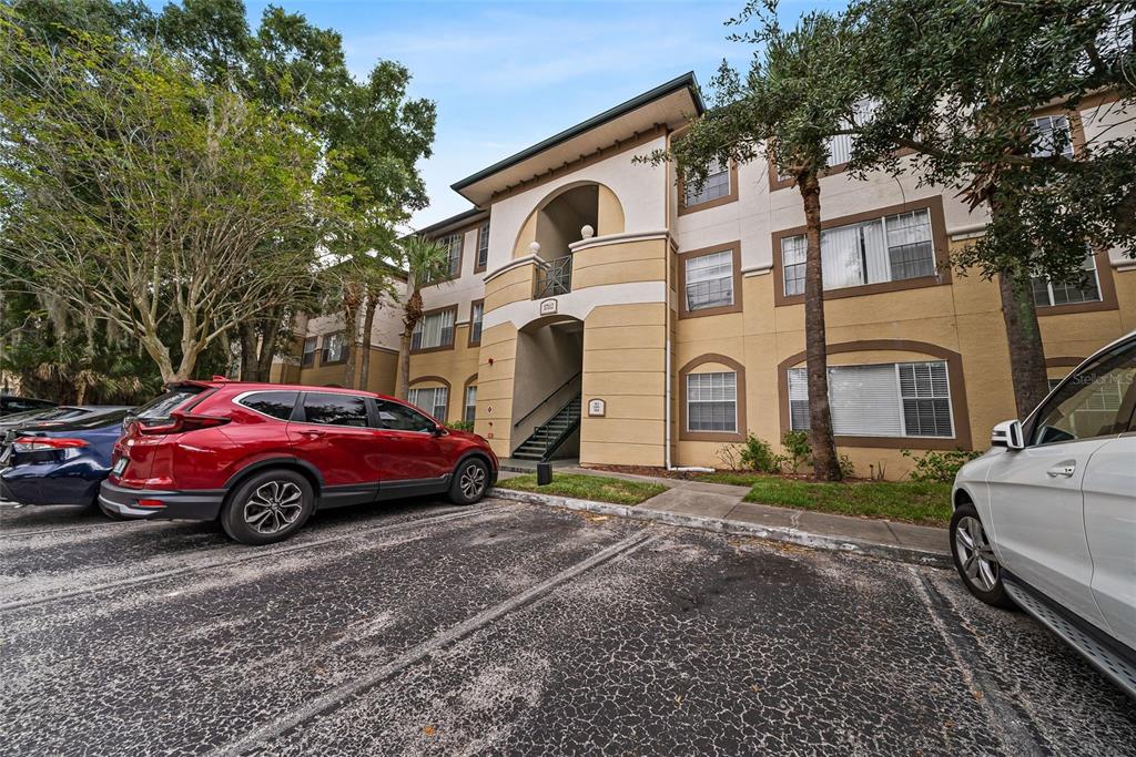 a front view of a house with parking space