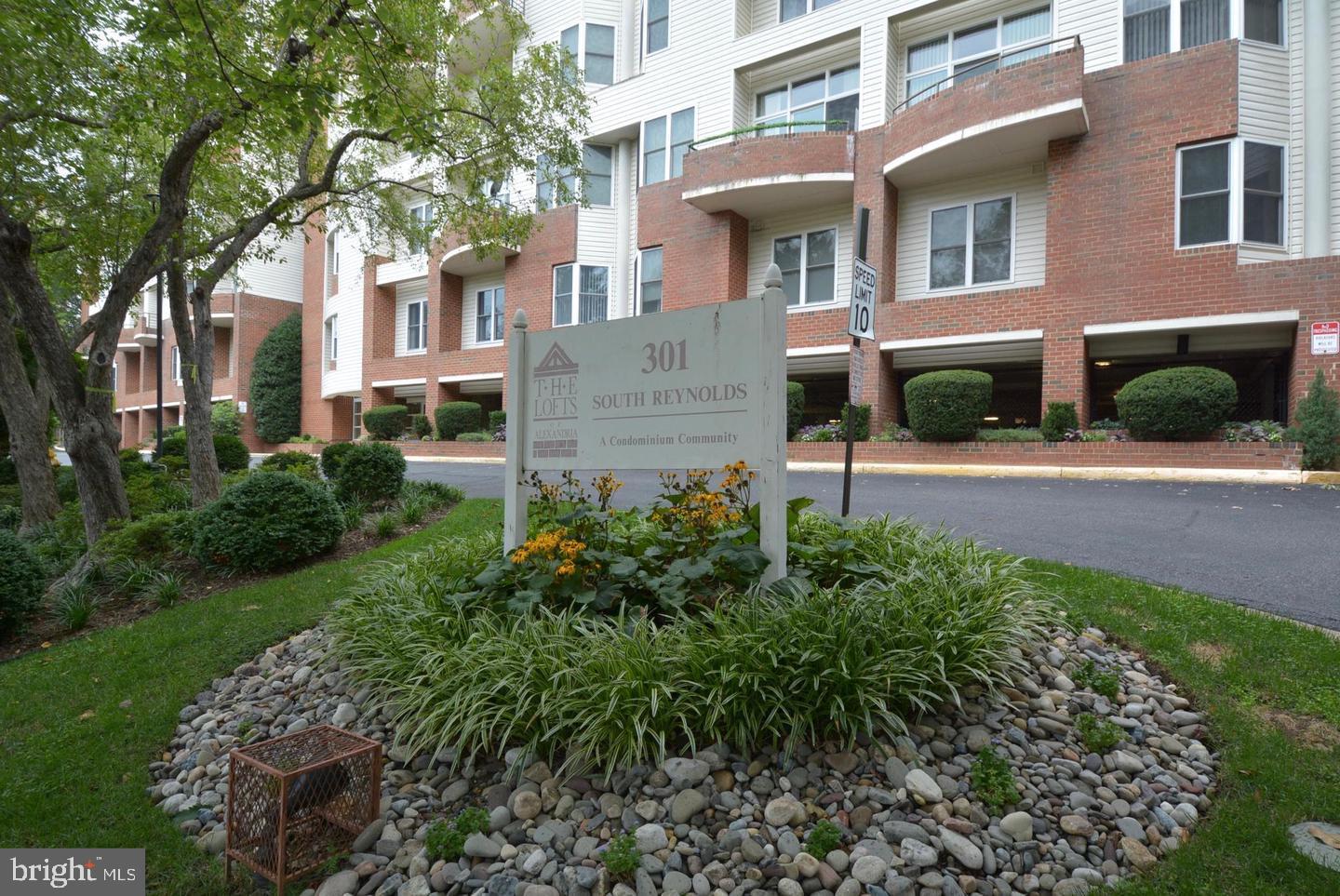 a view of a building with a garden