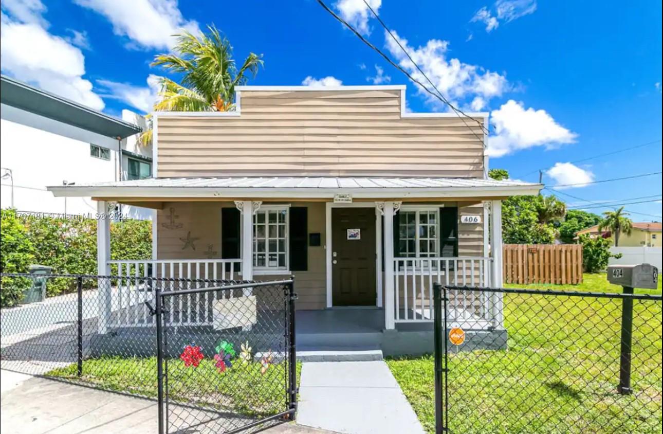 a front view of a house with a porch