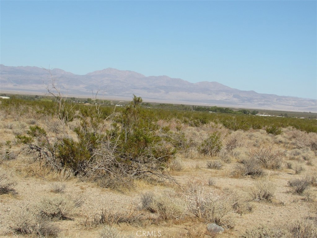 a view of an outdoor space with mountain