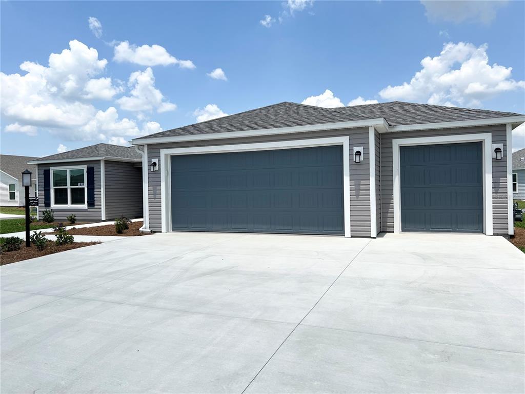 a view of a house with a garage