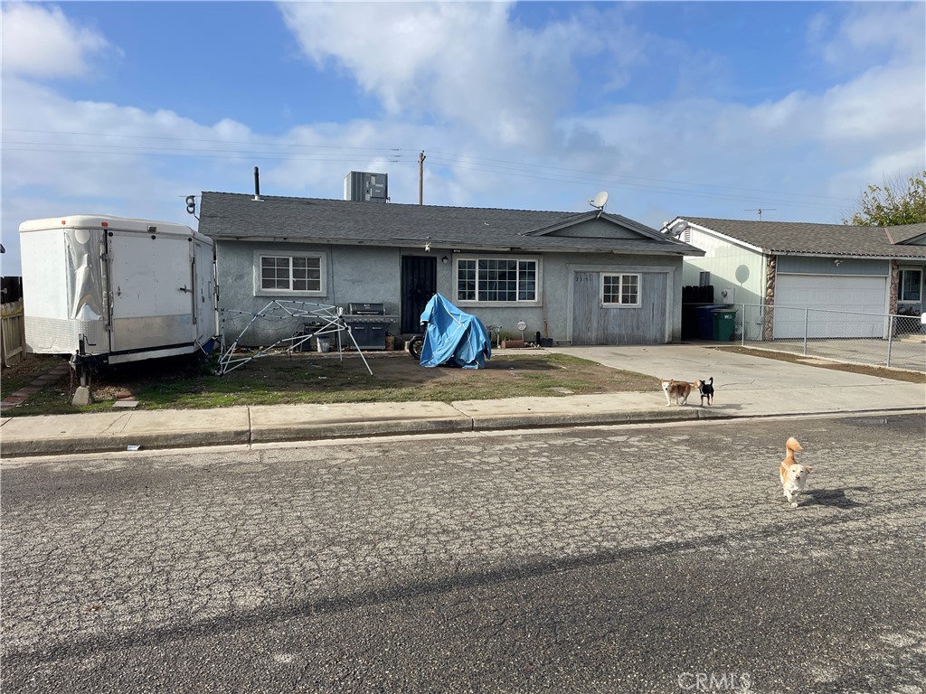 a front view of a house with yard