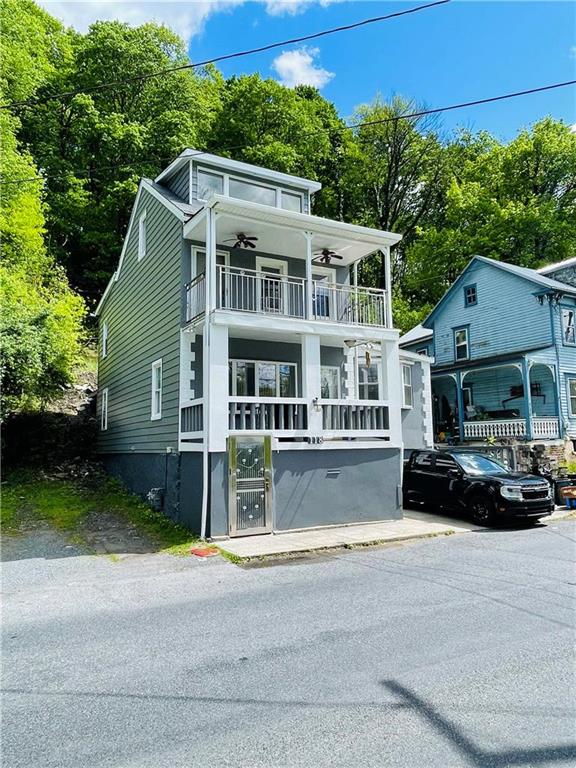 a car parked in front of a house