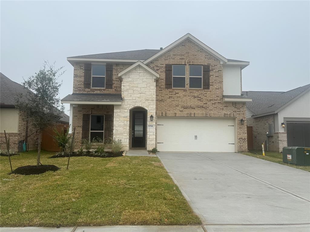 a front view of a house with yard