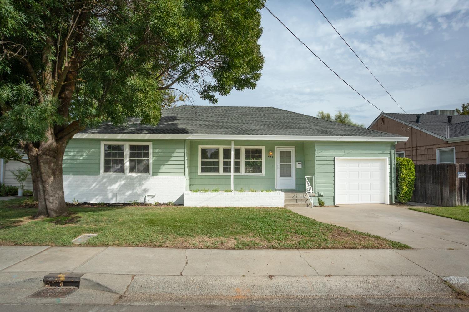 front view of a house and a yard