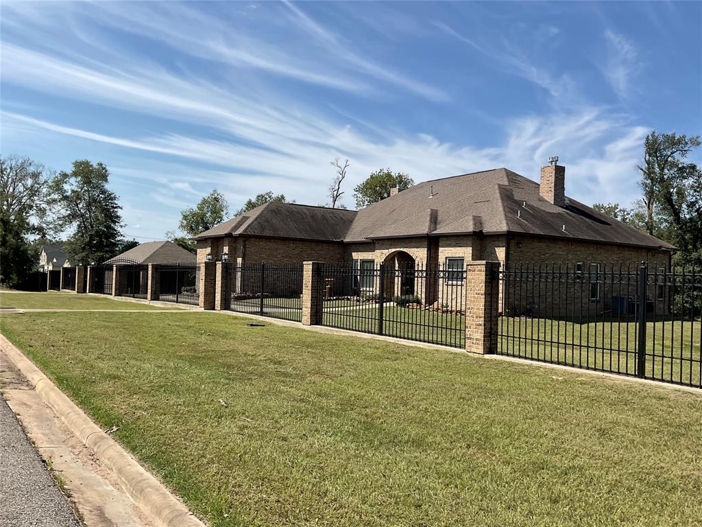 Welcome to your dream oasis! Nestled behind a private gate, this exquisite custom-built all-brick home offers the perfect blend of luxury, comfort, and nature—all on a sprawling expanse of picturesque acreage.