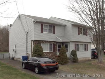 a car parked in front of house