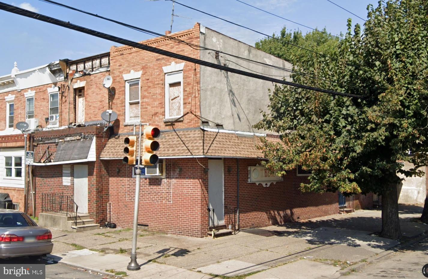 a front view of a building with street view