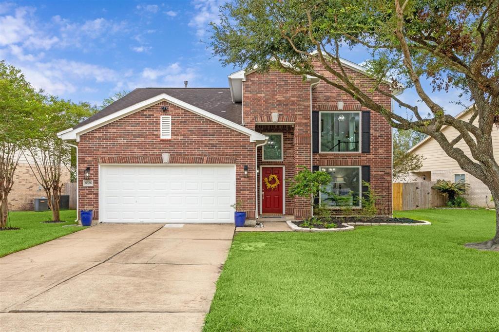 a front view of house with yard