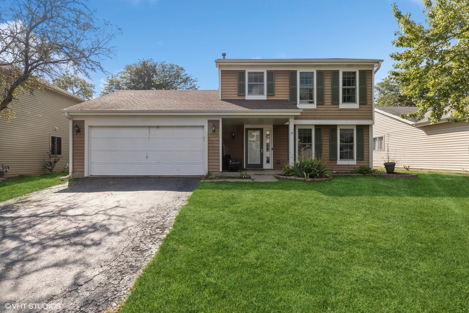 a front view of house with yard