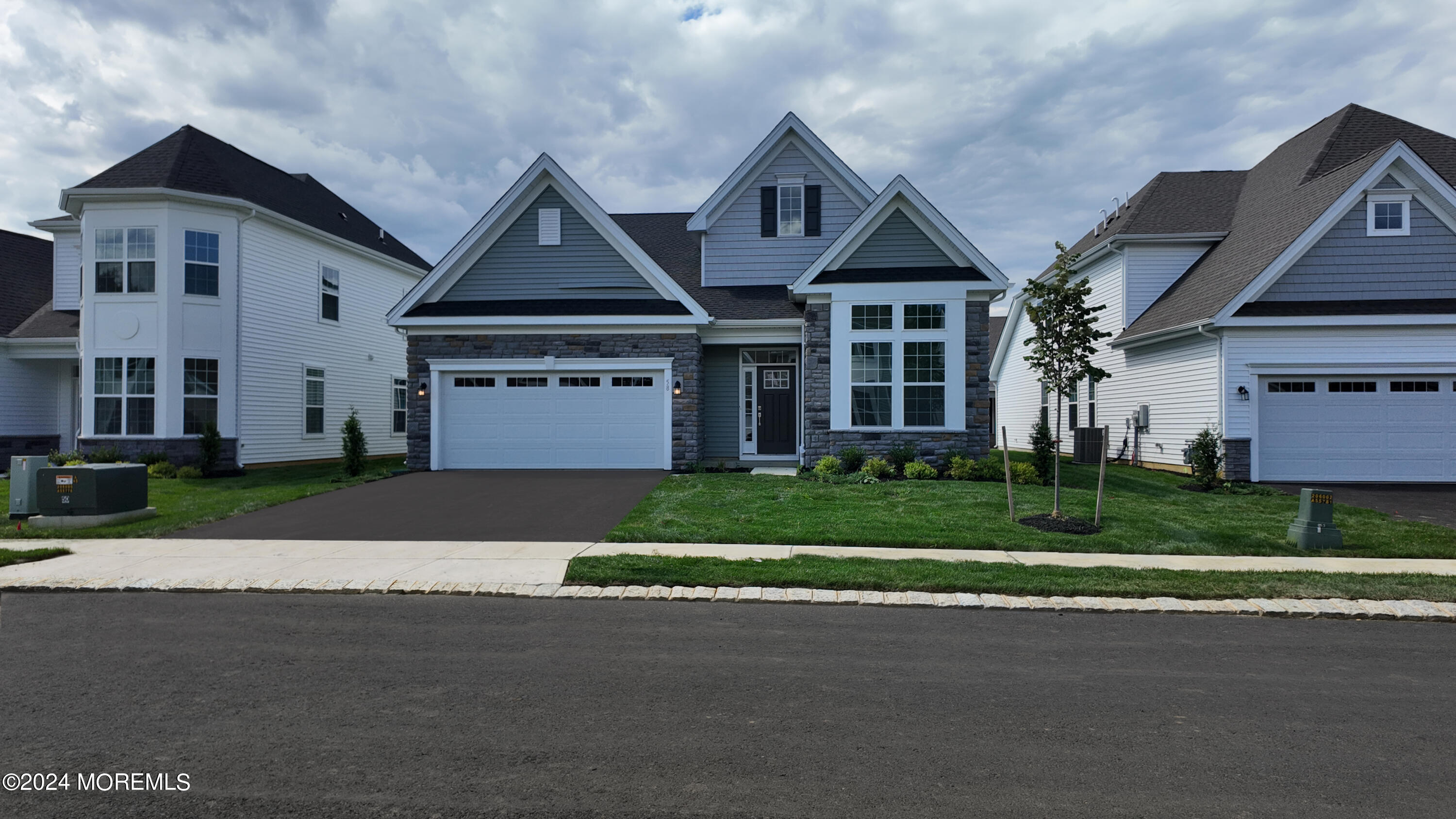 front view of a house with a yard