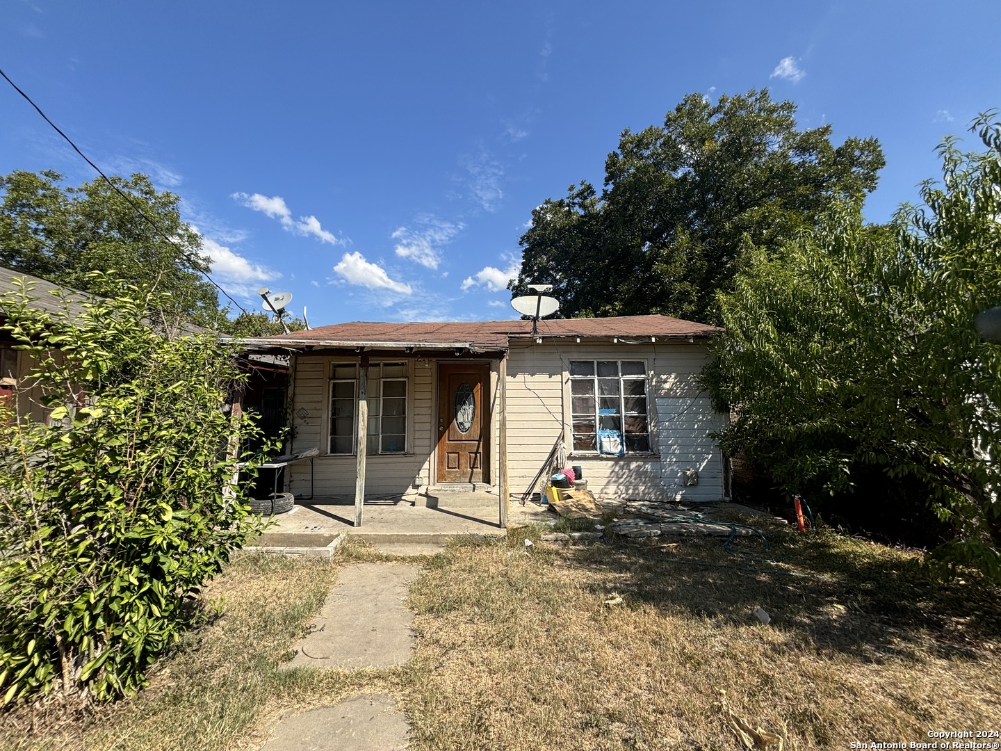 a view of a house with a patio