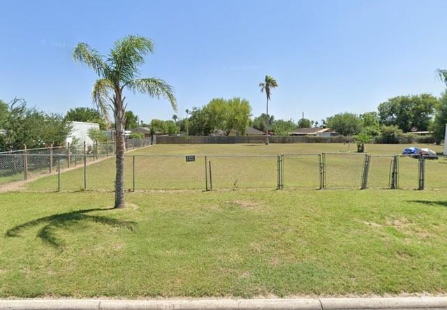 a view of a lake with a yard