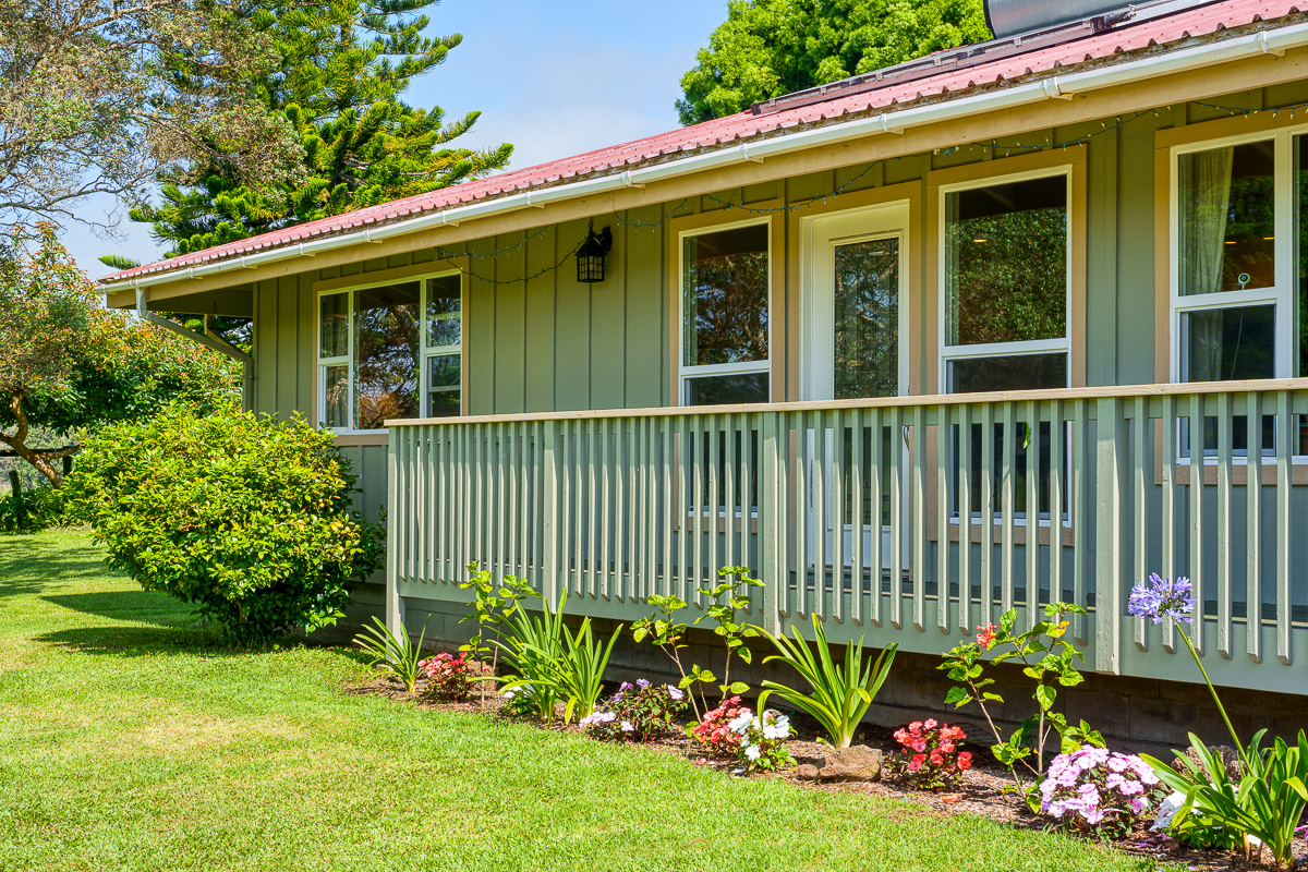 a view of a house that has a garden