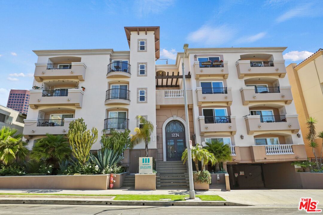 a front view of a multi story residential apartment building