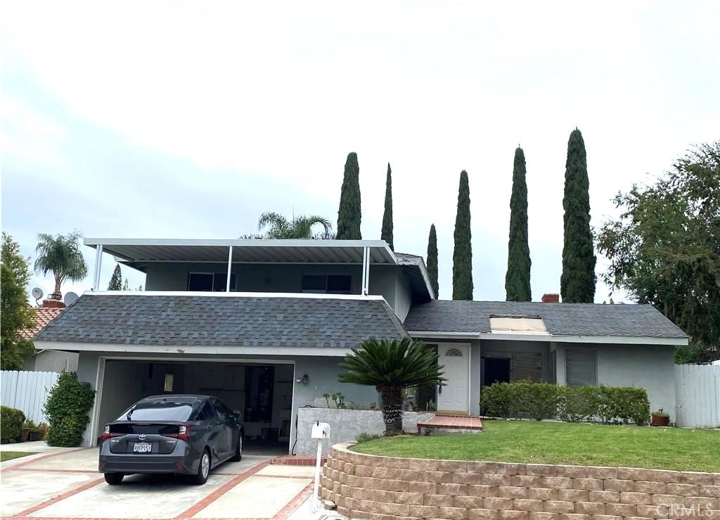 a car parked in front of a house