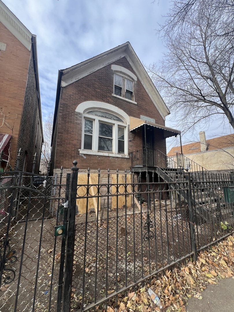 a front view of a house with garage