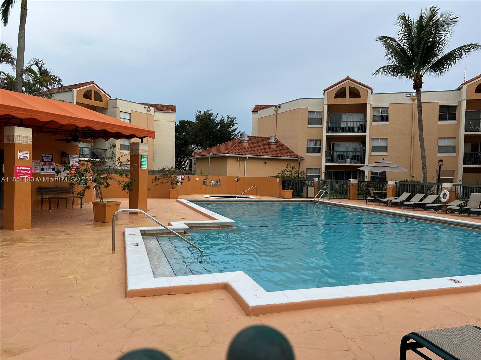 a view of a house with a swimming pool