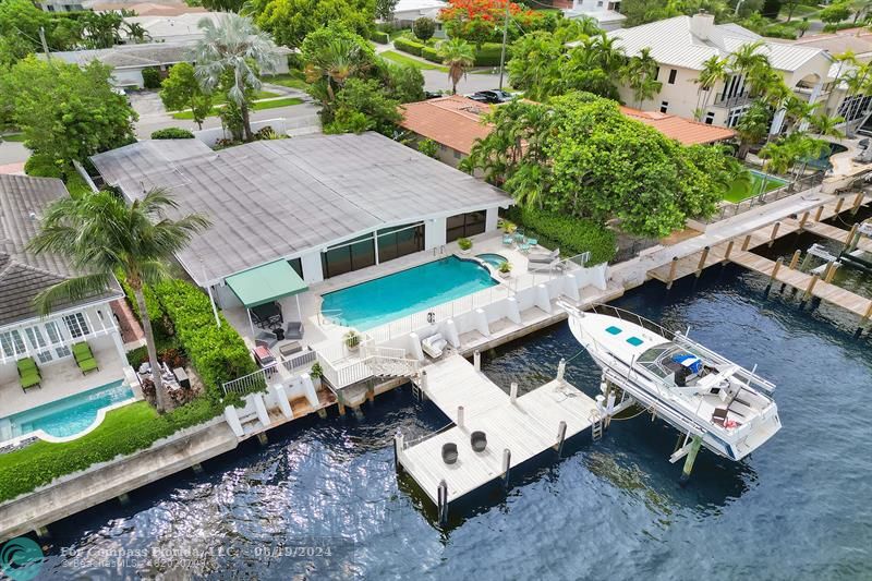 an aerial view of a house with balcony