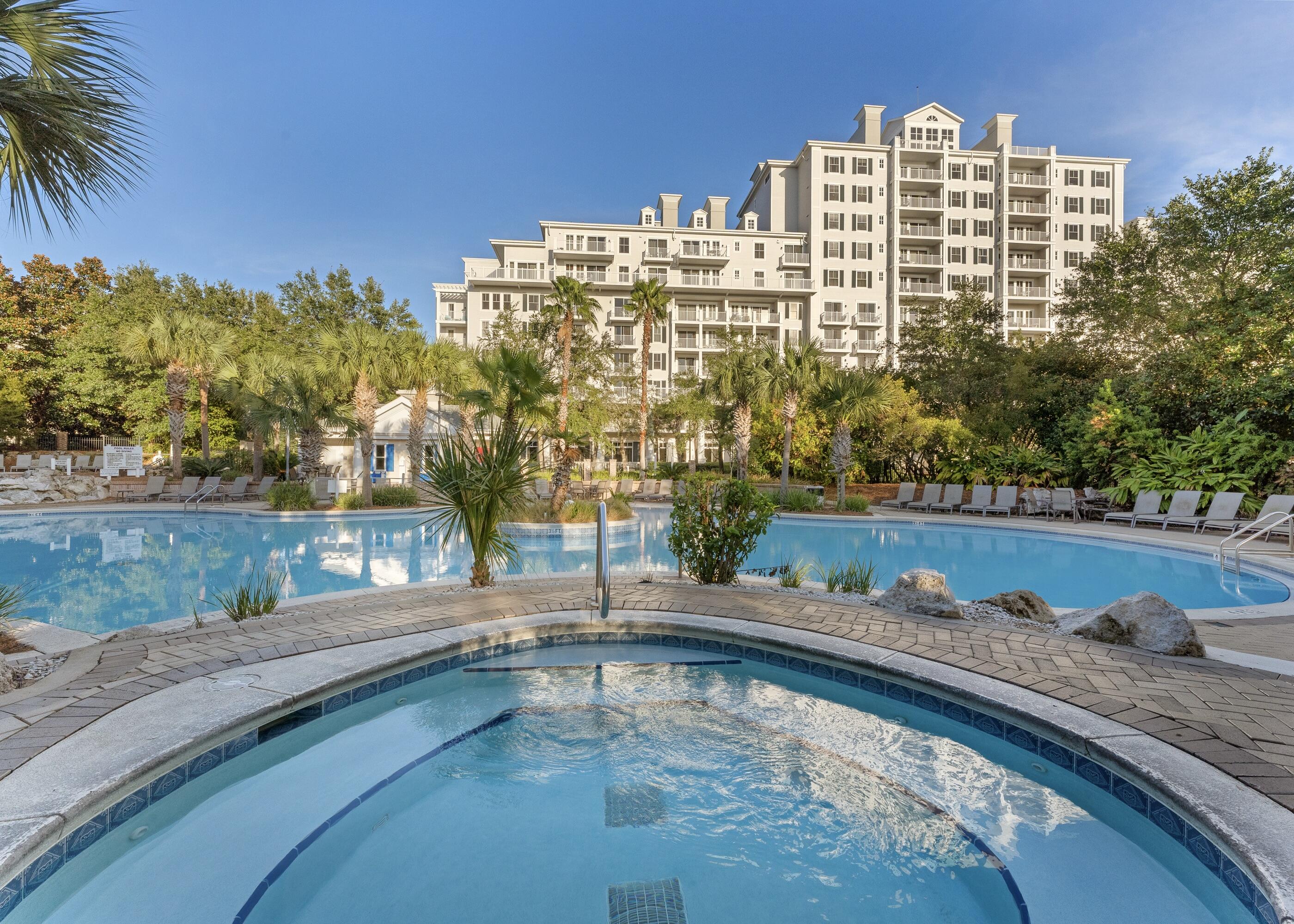 a view of swimming pool from a balcony