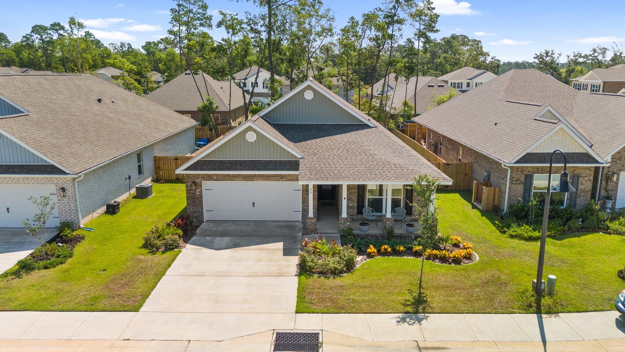 a aerial view of a house with a swimming pool