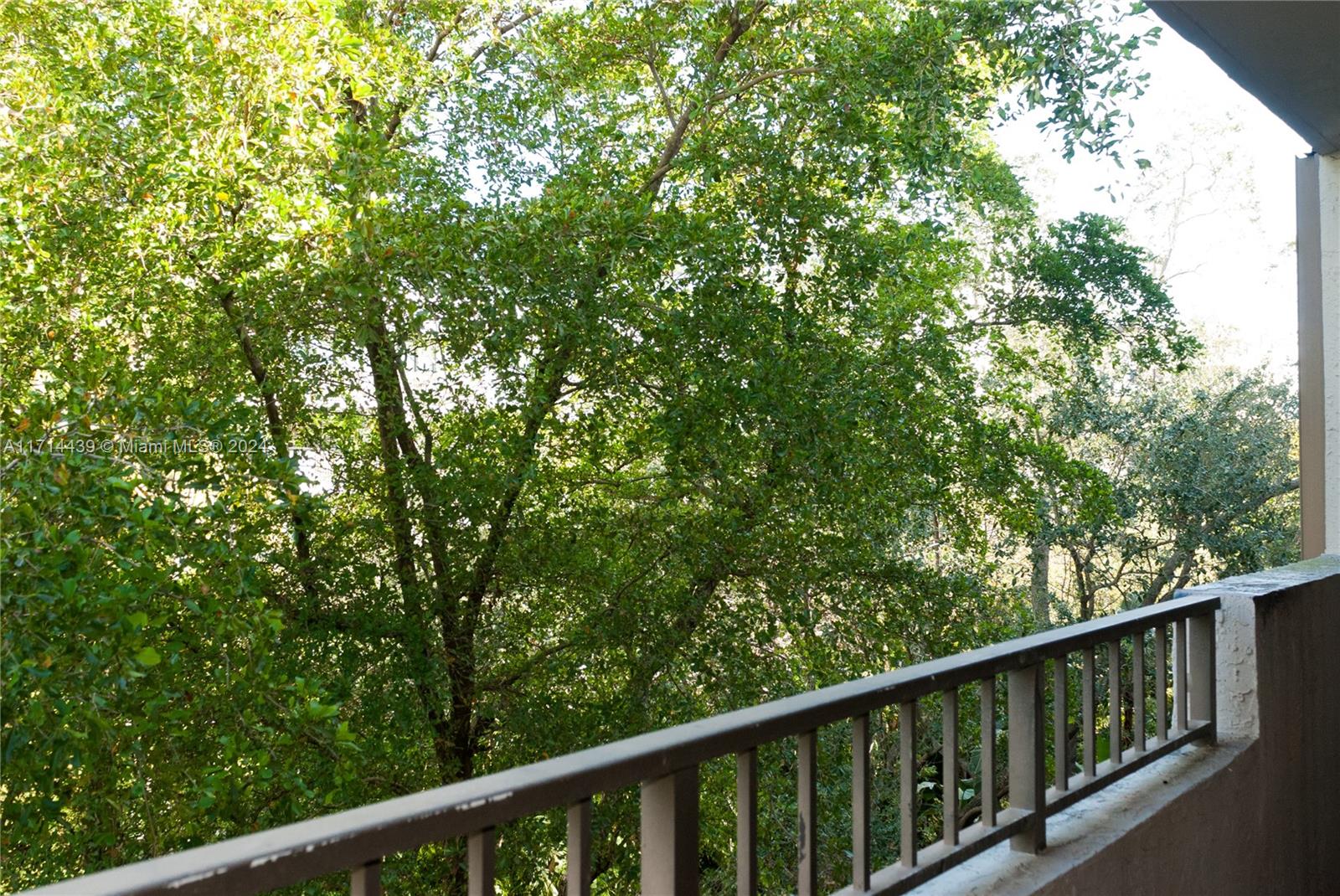 a balcony with wooden fence