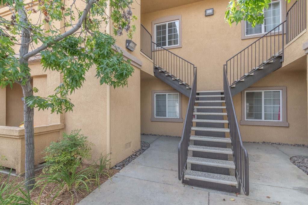 a view of a house with entryway and stairs