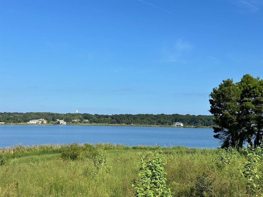 a view of lake with city view