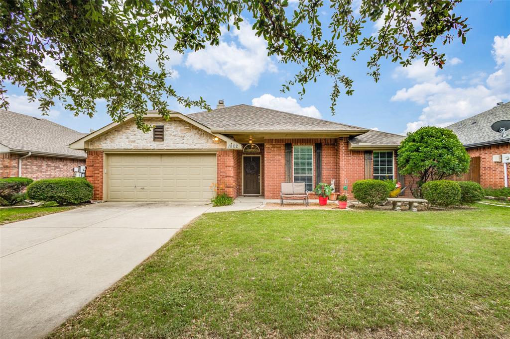 a front view of a house with having yard