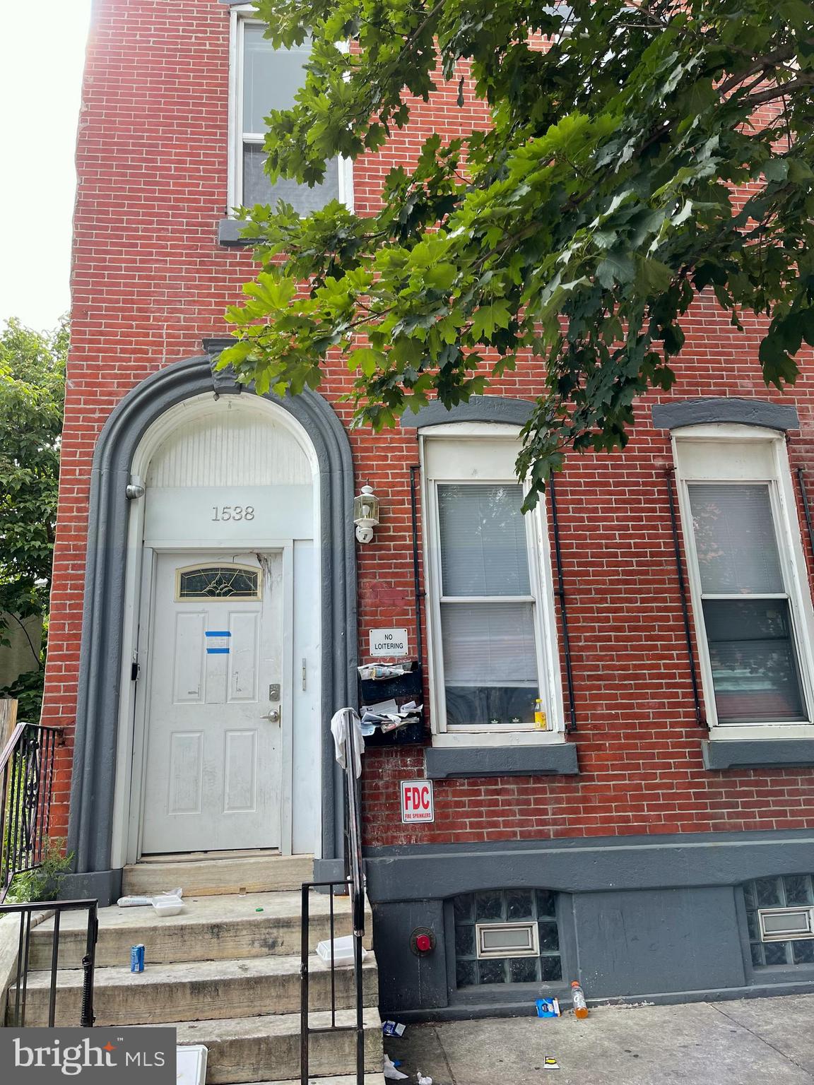 a front view of a multi story residential apartment building