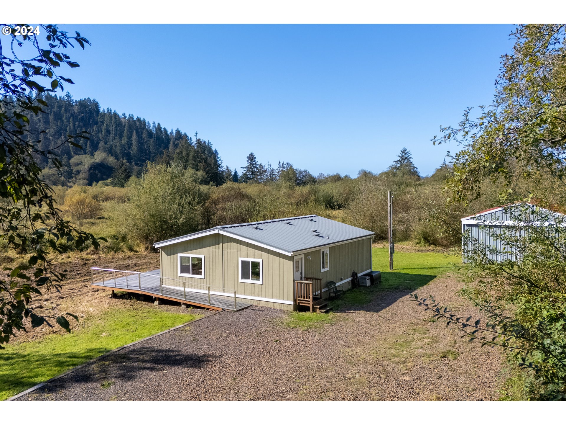 a aerial view of a house with a big yard