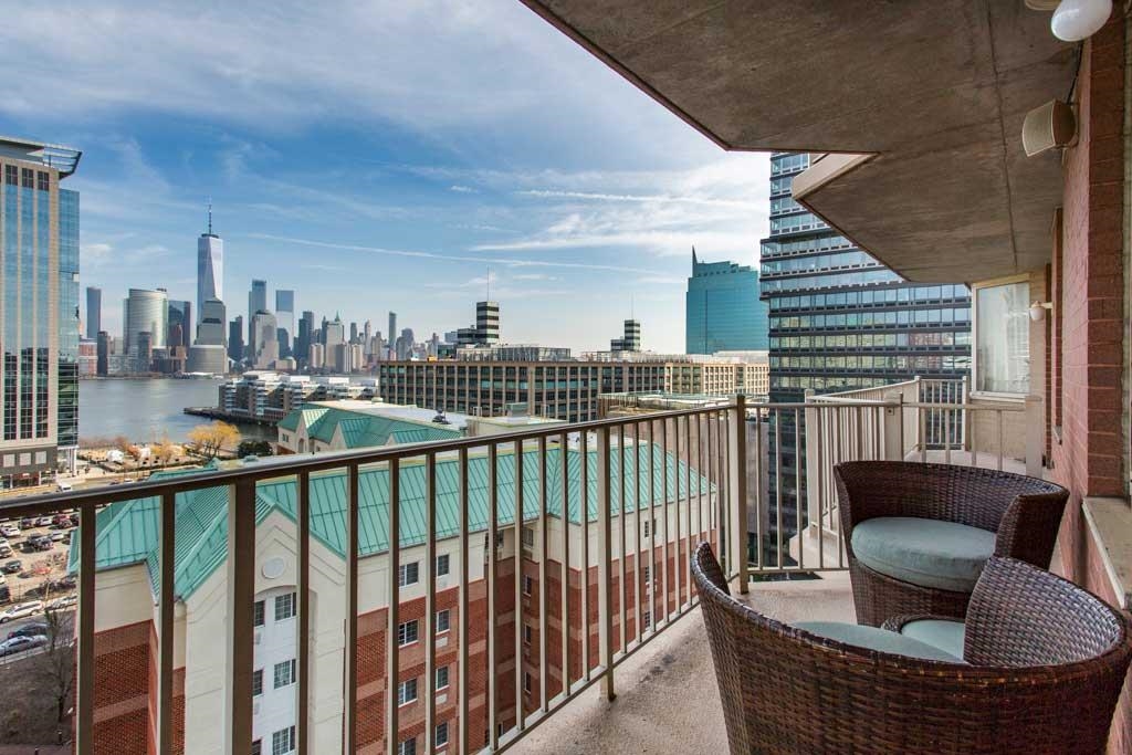 a view of balcony with outdoor seating