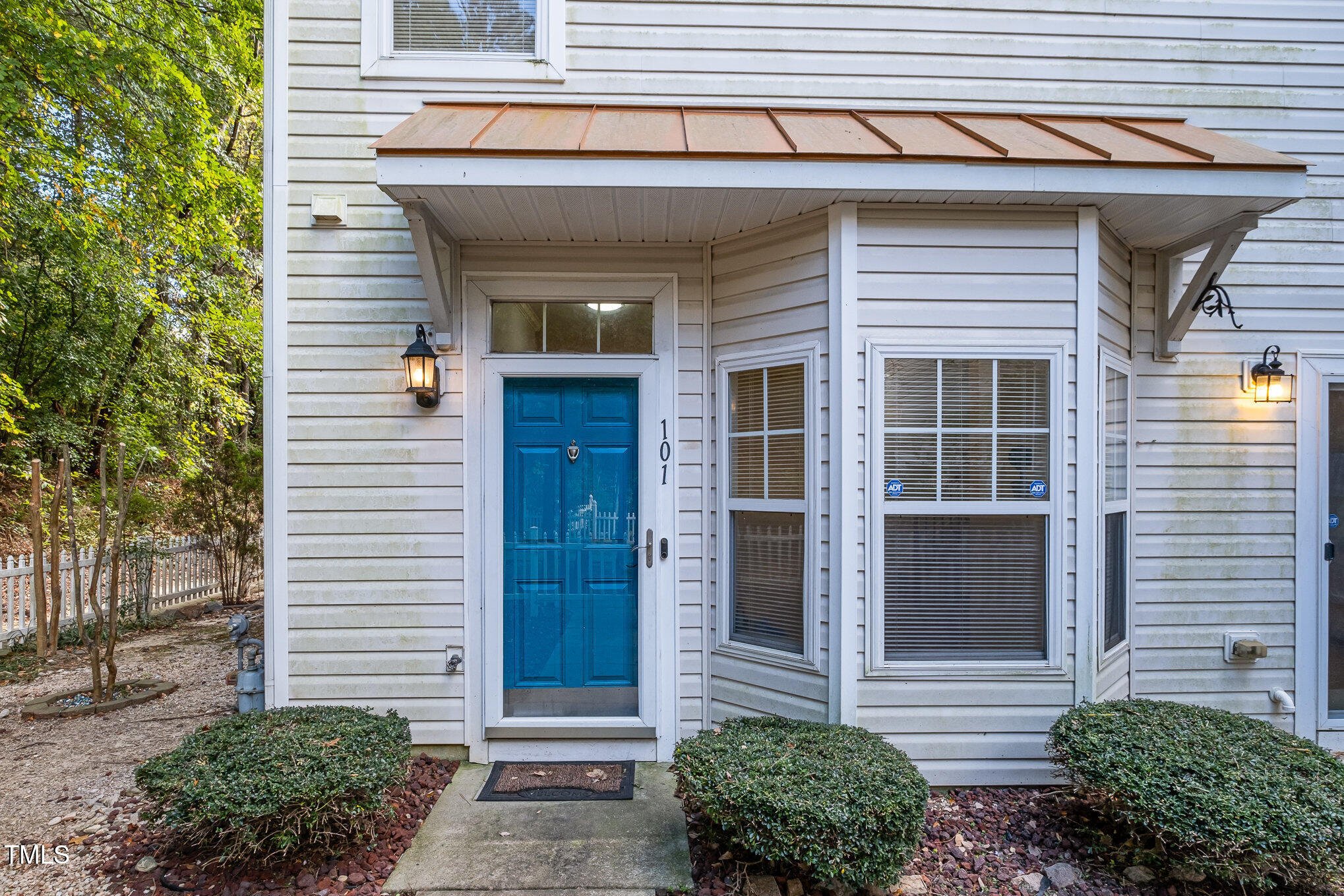 a front view of a house with a garage