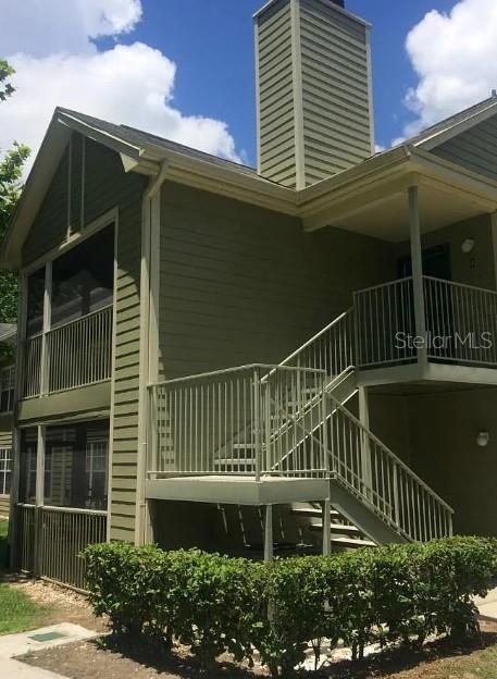 a front view of a house with a deck