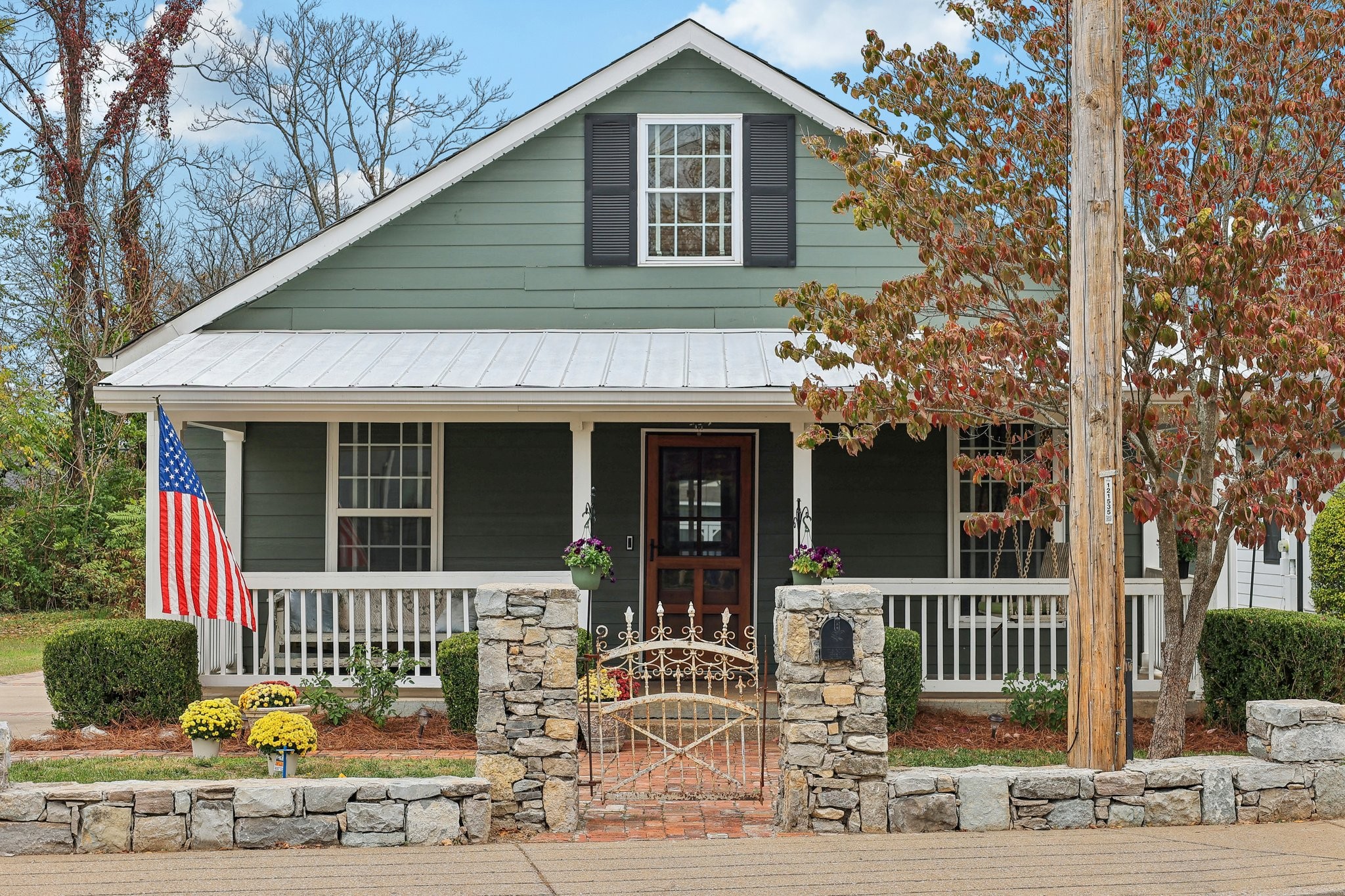 a front view of a house with a porch