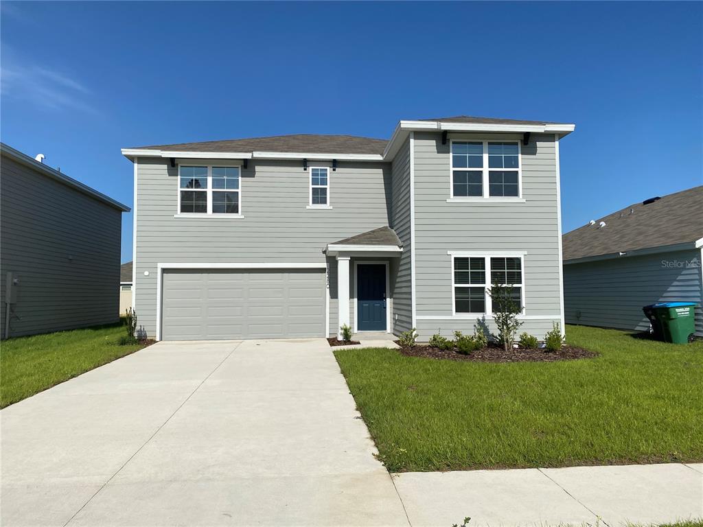 a front view of house with yard