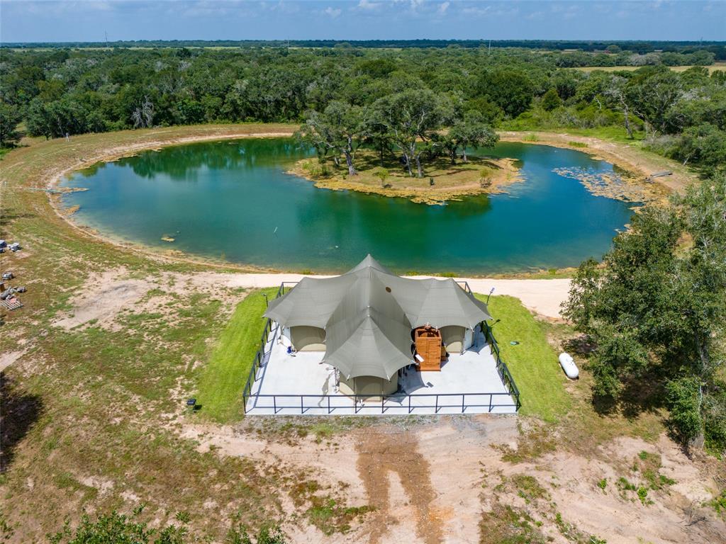 a view of a lake with a yard