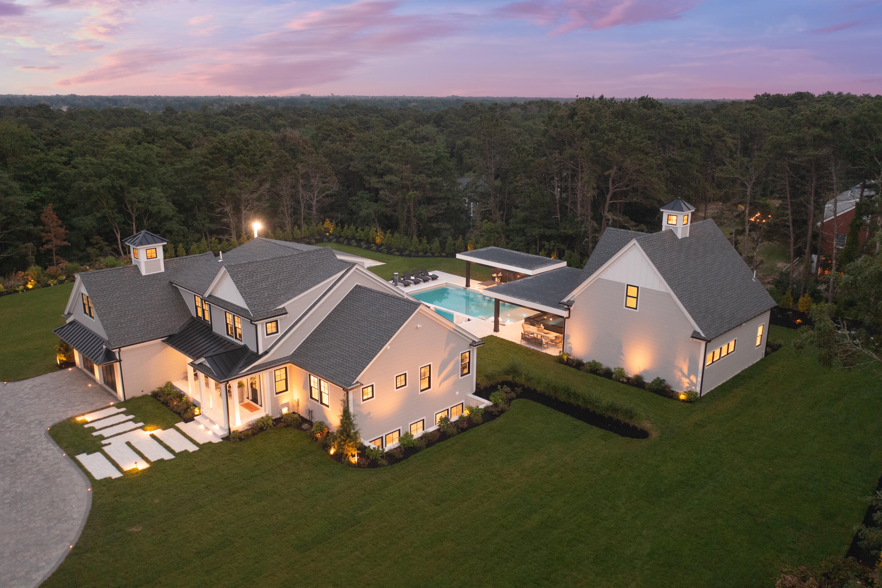 an aerial view of a house with a garden