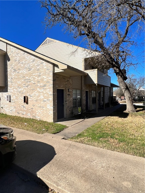 a view of a house with a patio